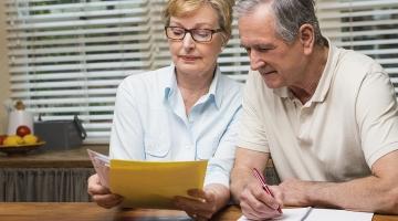 image of a couple organizing medical records